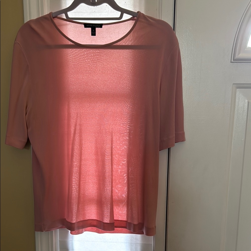 Women’s pale pink blouse in a size small